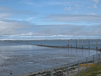IMG 3824  Uitzicht naar rechts vanuit strand Nessmersiel met in de verte het eiland Baltrum